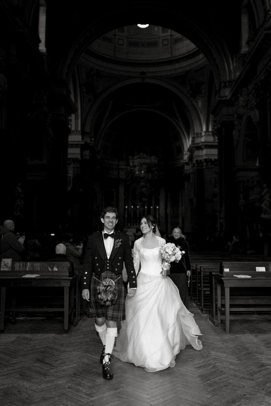 Alisdair and Isobel on their wedding day at the Brompton Oratory, London, 2026